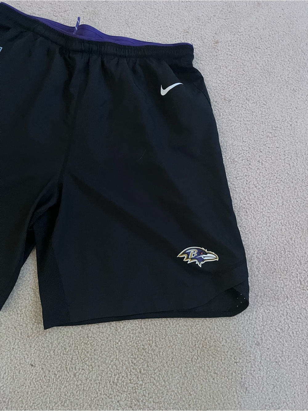 Nike Men's Black Athletic Shorts with Purple Waistband and Ravens Logo
